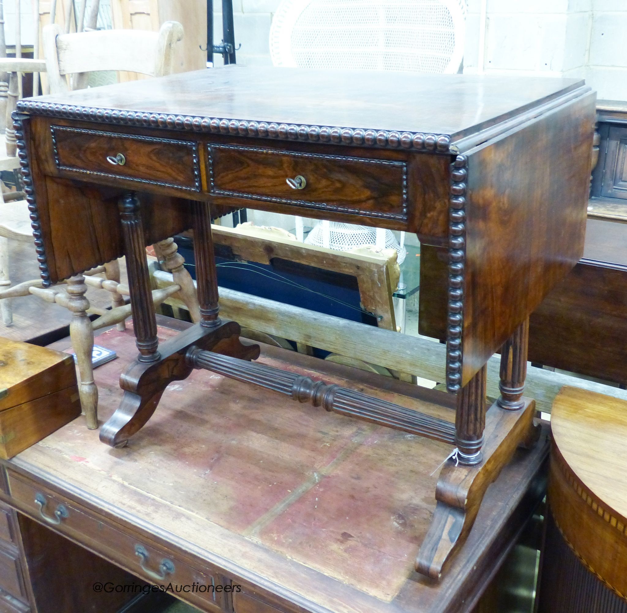 A 19th century French rosewood sofa table, width 86cm, depth 60cm, height 74cm